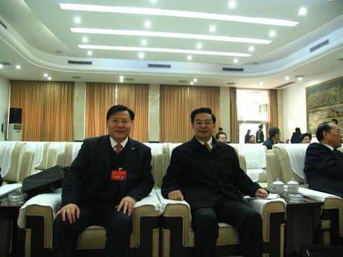 王董與最高人民法院院長、原湖南省省長周強在一起